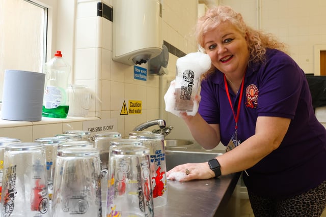 Forth Valley CAMRA Secretary Wendy Ross makes sure the pint glasses are clean.