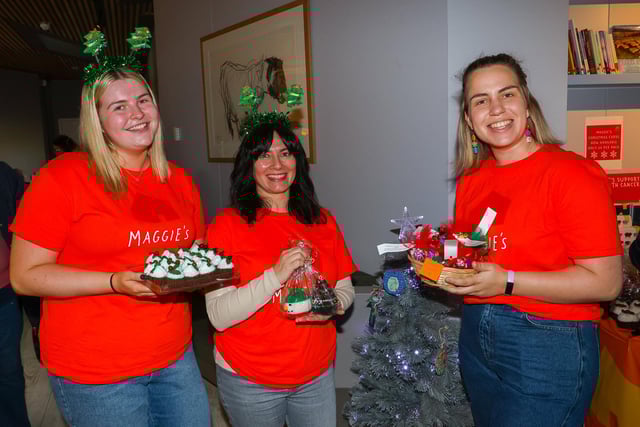 Carrigon, Christina and Rebecca prepare to encourage visitors to part with their cash for this great cause