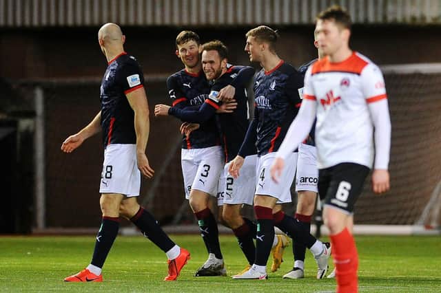 Falkirk players celebrate after Scott Mercer had put them 2-0 up at Clyde (Pic by Michael Gillen)