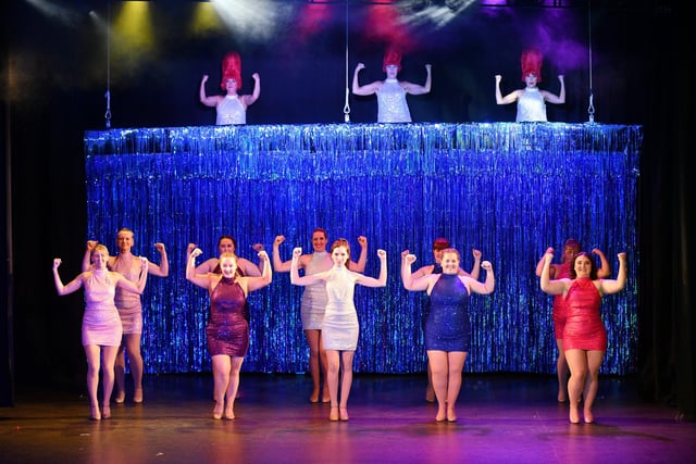 The Divas and Disco Dollies in a colourful opening number.