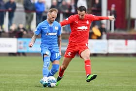 Liam Henderson battles with former Pars' winger Kallum Higginbotham last weekend against Kelty Hearts (Photos: Michael Gillen)