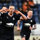 Aidan Nesbitt celebrates his first goal of the afternoon (Pics by Michael Gillen)