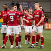 Stenny players celebrate going two goals up through Adam Corbett (Pictures by Scott Louden)