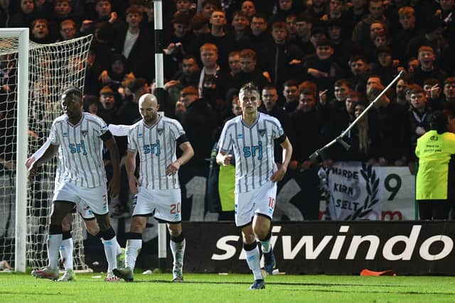 27-12-2024. Picture Michael Gillen. DUNFERMLINE. East End Park. Dunfermline Athletic FC v Falkirk FC. Season 2024 - 2025. SPFL William Hill Championship. Match Day 19. Dunfermline goal, Chris Kane 20 from the penalty spot. Crutch thrown from the Falkirk support towards Dunfermline players.
