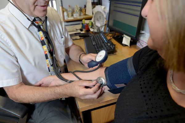 The Scottish Government’s ‘Settling In’ campaign, urges people to contact their GP practice if they have unusual breathlessness or a new or different persistent cough for more than three weeks. Photo: PA.