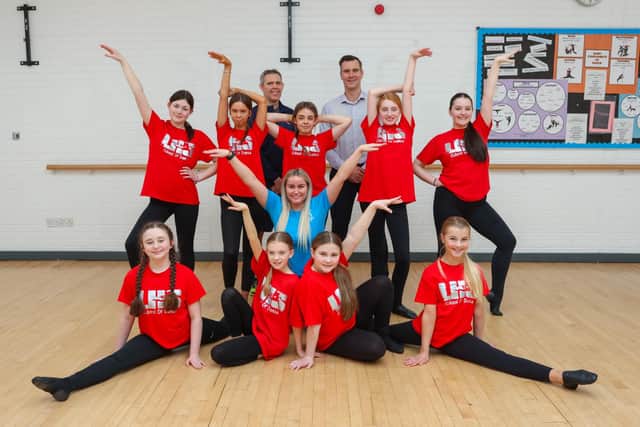 School of Dance pupils with teachers Miss Busby and Brian Townsend, along with Daniel Bajwoluk Marketing Manager of A.R.D. Consultancy. Pic Scott Louden