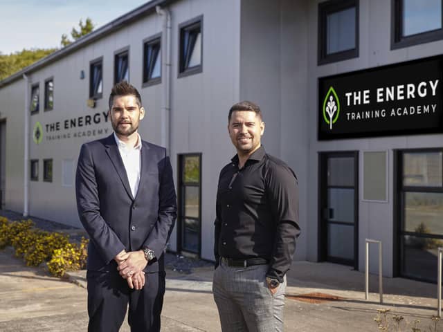 Mark Glasgow and HeatFix Scotland managing director Andrew Lamond (L)