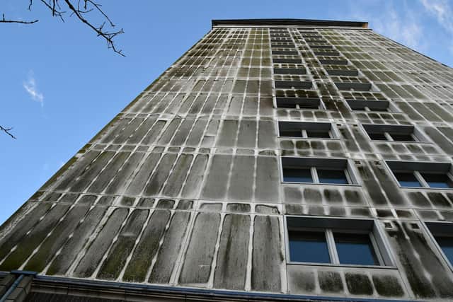 Residents are concerned about the black mould on the exterior of the block of flats