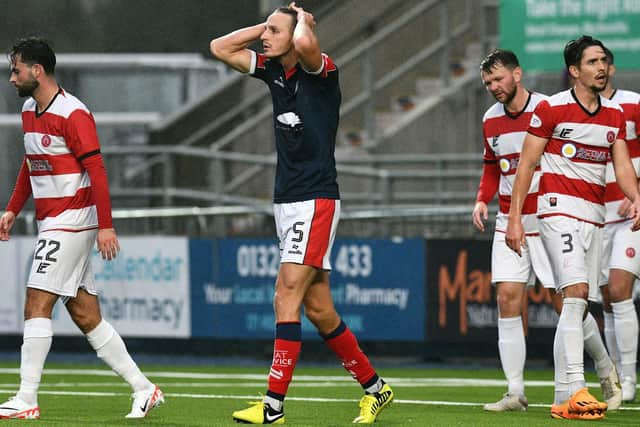 Falkirk's Liam Henderson after missing a chance