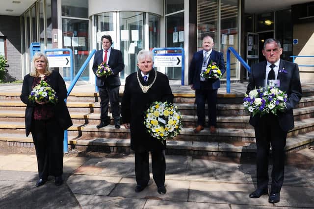Paying tribute:  At Falkirk Municipal Building on International Workers Memorial Day are Cecil Meiklejohn, SNP group leader Falkirk Council; Councillor Robert Bissett; Provost William Buchanan; Councillor James Kerr and Duncan McCallum, secretary of Falkirk Trades Union Council.