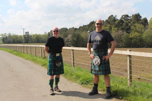 Linlithgow & Bo'ness Rotary Club member Martin Brownlie and vice president Jamie Frame walking the Kiltwalk challenge.