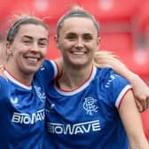 CUMBERNAULD, SCOTLAND - APRIL 02: Rangers' Sam Kerr (R) celebrates scoring to make it 2-0 with teammate Nicola Docherty during a Park’s Motor Group SWPL match between Rangers and Hibernian at Broadwood Stadium, on April 02, 2023, in Cumbernauld, Scotland.  (Photo by Mark Scates / SNS Group):