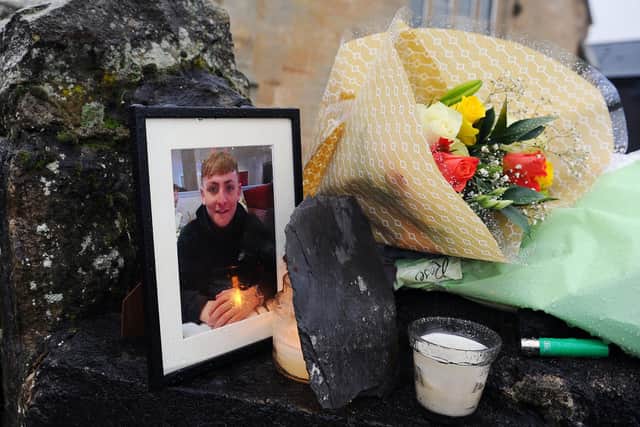 Tributes to teen Harley Smith at the scene where he died in Laurieston in November 2020