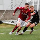 Adam Corbett battles for possession with Rovers' Josh Jack (Pictures: Scott Louden)