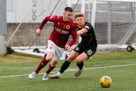Adam Corbett battles for possession with Rovers' Josh Jack (Pictures: Scott Louden)