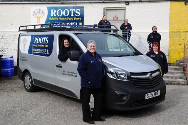 ROOTS Helping Hands Food Share volunteers with their new van to help with deliveries in March last year. Funded from Denny and District Community Fund, administered by Foundation Scotland. Front: Jennifer Cochrane, secretary; Teresa Cochrane, treasurer and Gemma Douglas, parcel coordinator. Back: Arlene Graham, chairperson; Sheralee Maxwell, parcel coordinator and Scott Douglas, handyman driver.