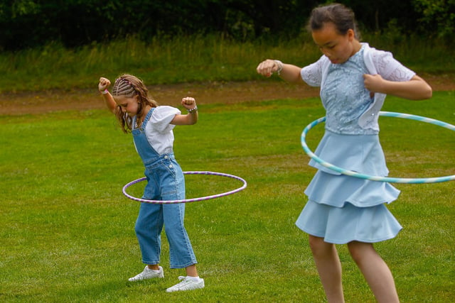 Participants in the hula hoop contest
