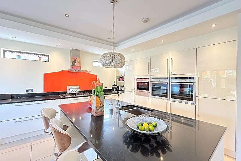 The modern open plan dining kitchen is at the heart of the home.