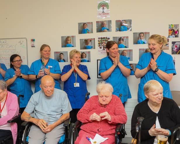 Staff and residents at the launch party.
