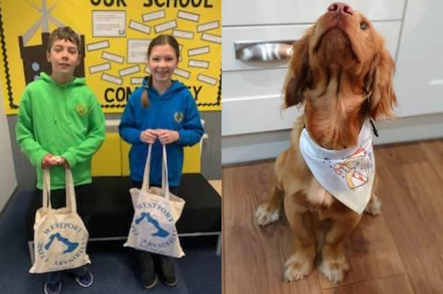 Winner Annie Morrison (left in photo) with 3rd place winner Ben Goldfinch (right) both pupils at Low Port Primary School Linlithgow, and the winning design being modeled by Vet Stuart McMorrow's dog.