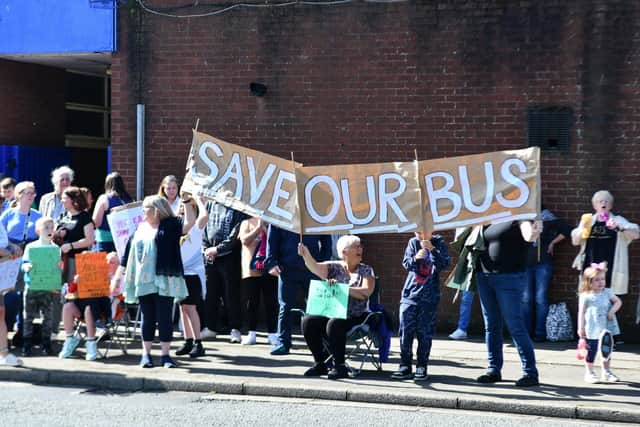 Around 80 people from Tamfourhill turned up at the bus depot to protest about the number 6 bus service being axed. Pic: Michael Gillen