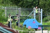 Police continue their investigations in Coneypark Crescent near a playpark and allotments close to Glenskirlie Castle. Pic: Michael Gillen