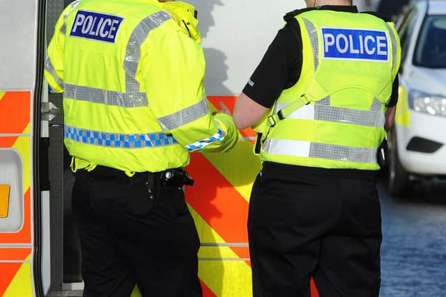 A large number of police officers were on the scene at an address in Crichton Gardens, Grangemouth