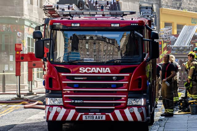 Pic: Lisa Ferguson
Firefighters attend a fire on George IV Bridge. The fire started early hours of this morning
Fire crews have been tackling a large blaze which broke out at Edinburgh's George IV Bridge.
Police Scotland closed several roads in the city's old town on Tuesday morning and said officers were assisting the Scottish Fire and Rescue Service .
The alarm was raised shortly after 6am by a cleaner at Edinburgh's Elephant House cafe - where JK Rowling penned her first Harry Potter book.
It is believed the fire started in the Patisserie Valerie cafe next door.
Elephant House owner David Taylor, said the fire had not spread to the building, but it had suffered smoke and water damage.