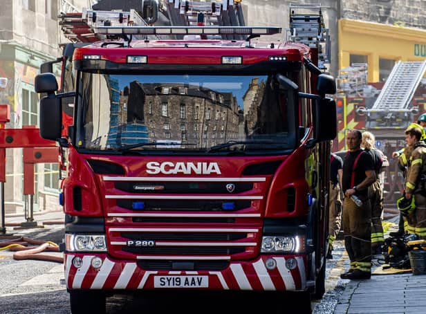 Pic: Lisa Ferguson




Firefighters attend a fire on George IV Bridge. The fire started early hours of this morning





Fire crews have been tackling a large blaze which broke out at Edinburgh's George IV Bridge.



Police Scotland closed several roads in the city's old town on Tuesday morning and said officers were assisting the Scottish Fire and Rescue Service .



The alarm was raised shortly after 6am by a cleaner at Edinburgh's Elephant House cafe - where JK Rowling penned her first Harry Potter book.



It is believed the fire started in the Patisserie Valerie cafe next door.



Elephant House owner David Taylor, said the fire had not spread to the building, but it had suffered smoke and water damage.