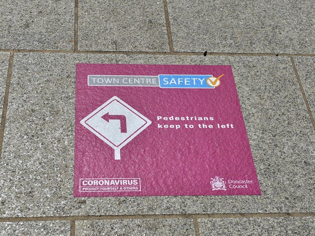 Sign in Doncaster town centre tells pedestrians to keep to left hand side of the road