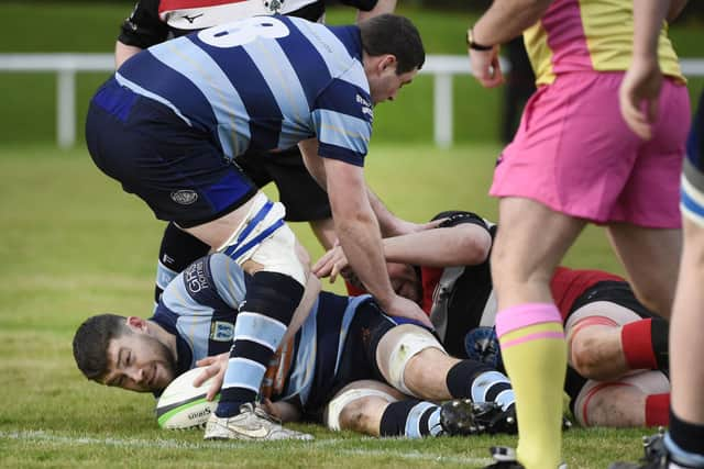 Stewart McCulloch rucks over to retain possession