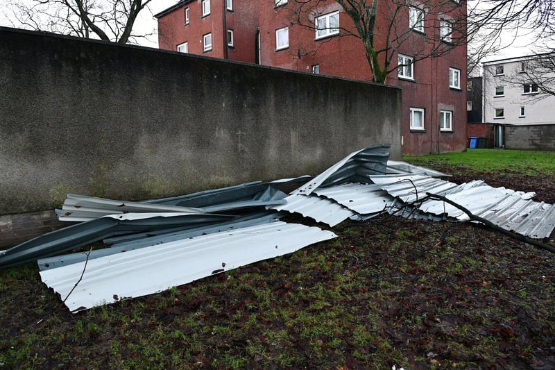 Storm Isha brings down a roof from maisonettes in Derwent Avenue, Bantaskine.