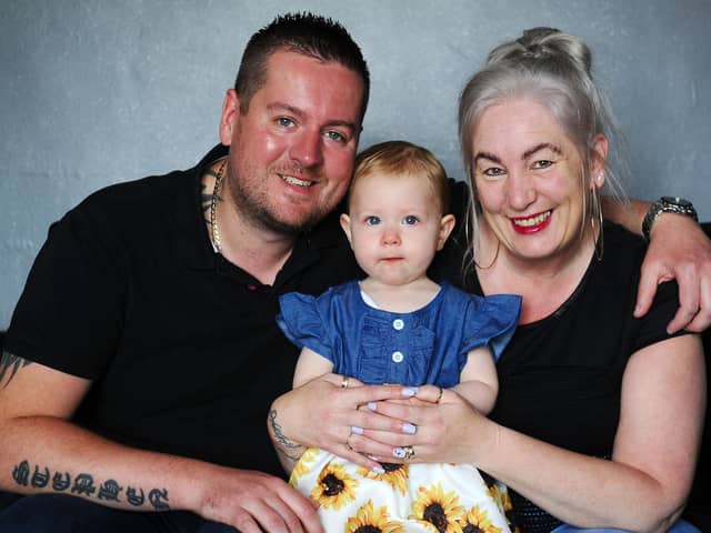 Stephen Shaw and Georgina Leslie with one-year-old daughter Aleena.  Pic: Michael Gillen.