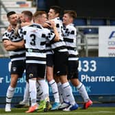 The Shire players celebrate after scoring against CS Strollers in their Lowland League opener last Saturday