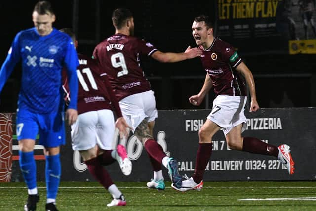 Michael Anderson wheels away after scoring (Photo: Michael Gillen)