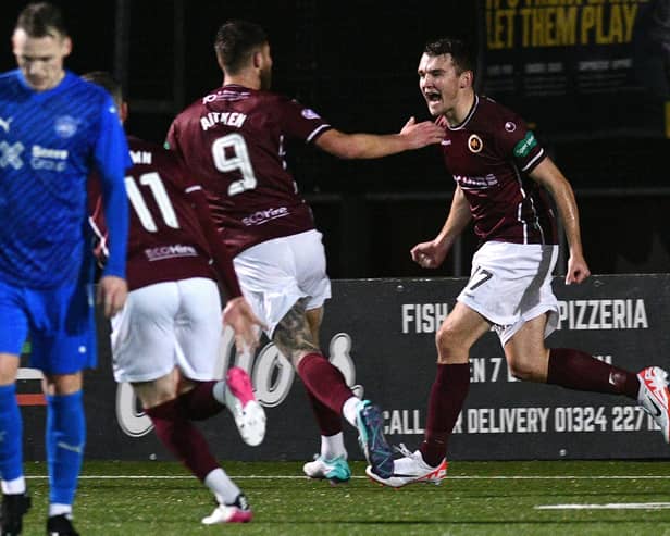 Michael Anderson wheels away after scoring (Photo: Michael Gillen)