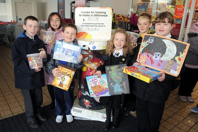 Sainsbury's in Denny had a presentation of sports equipment and Halloween prizes to Dunipace and Denny Primary Schools. Left to right, Marc Campbell, Sophie McWatt, Gavin Robertson, Morag Macdonald, Dylan Russell and Iona Patrick.