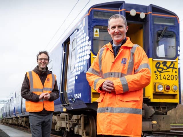 Scottish Transport Secretary Michael Matheson with the retired ScotRail Class 314 electric set which is being converted to a hydrogen-powered model at Bo'ness and Kinneil Railway.