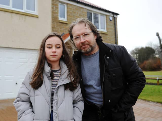 Harry Norrie and daughter Eva Norrie at their home in Carron Park (Picture: Michael Gillen)