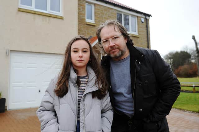 Harry Norrie and daughter Eva Norrie at their home in Carron Park (Picture: Michael Gillen)