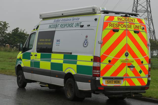 A woman was taken to hospital by ambulance following a motorbike crash in Stirling. Picture: Michael Gillen.