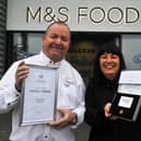 Long service pin presented  Loretta Glennie to mark 40 years with M&S. She is pictured with store manager, Brian Torley (Pic: Michael Guillen)