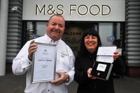 Long service pin presented  Loretta Glennie to mark 40 years with M&S. She is pictured with store manager, Brian Torley (Pic: Michael Guillen)