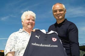 Pictured in 2015, Val McDermid with former manager Ray McKinnon at the unveiling of a Raith Rovers new strip. Picture: SNS