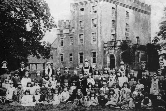 Children from an orphanage vist Herbertshire Castle in Dunipace some time in the 1890s