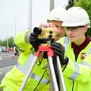 Andy Stevenson, Project Manager, at the Hillhouse Group shows Cameron Bell the ropes. Pic: Falkirk Council