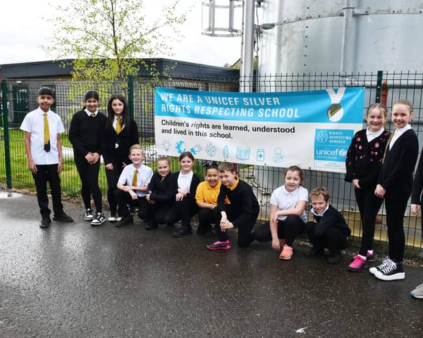 Carronshore Primary School pupils are delighted to have received the UNICEF Silver Rights Respecting Schools award. Pic: Michael Gillen