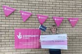 Angie Bailey with the cheque from the National Lottery's Community Fund towards the Open Day. Pic: Contributed