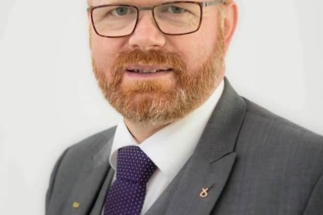 East Falkirk MP calls for Scots Guards' caps to switch from real
