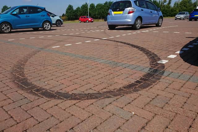 The monobloc in the car park has been damaged by cars 'doing donuts' and driving at excessive speeds